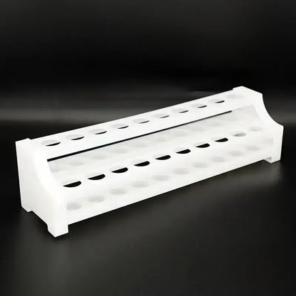 Compact wit buisrek met kleine reageerbuisjes